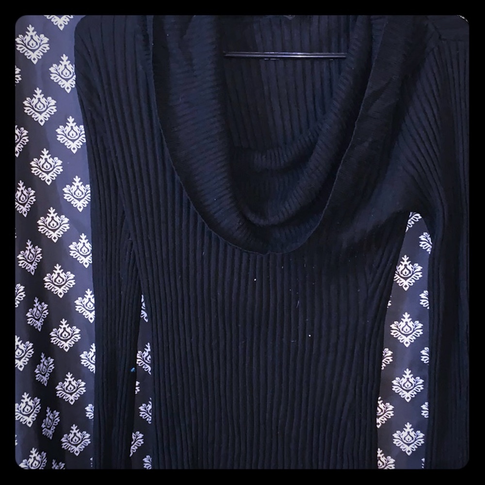 Black cowl neck sweater.